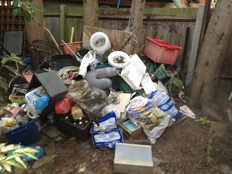 Different types of waste ready for skip collection